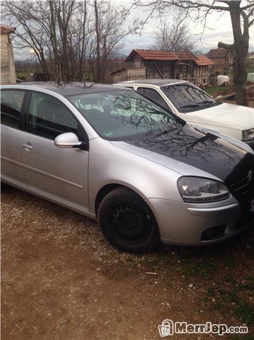 VW Golf 5  -05