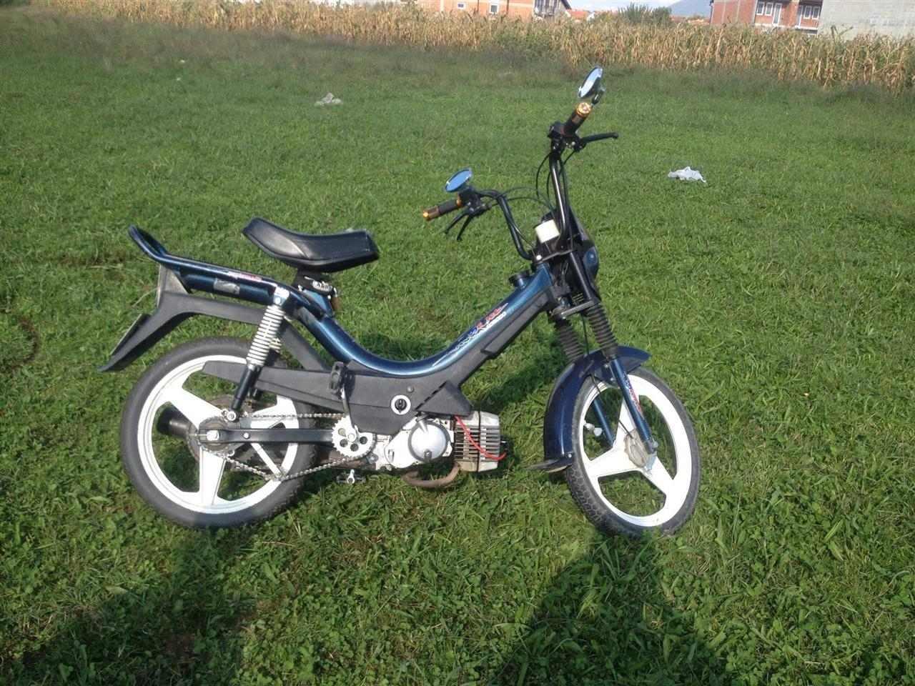 TOMOS