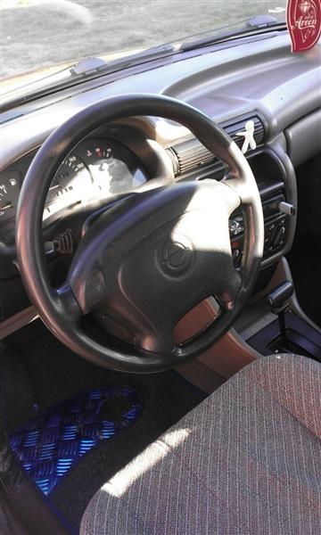 Opel-Astra-benzin--94-