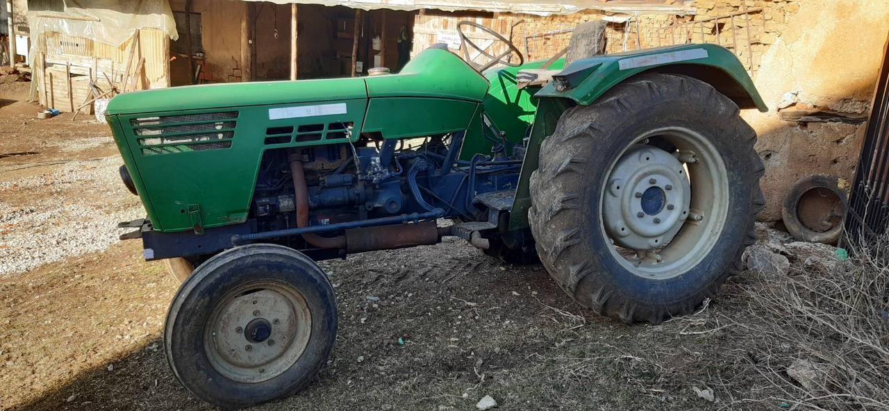 Tractor+-pllugj