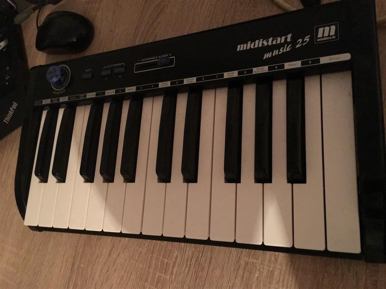 Mikrofon-dhe-MID-controller-