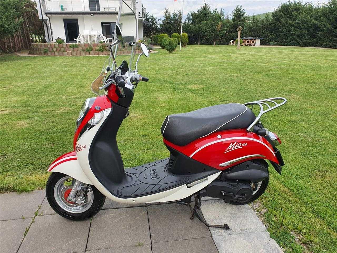 Sym-mio-100
